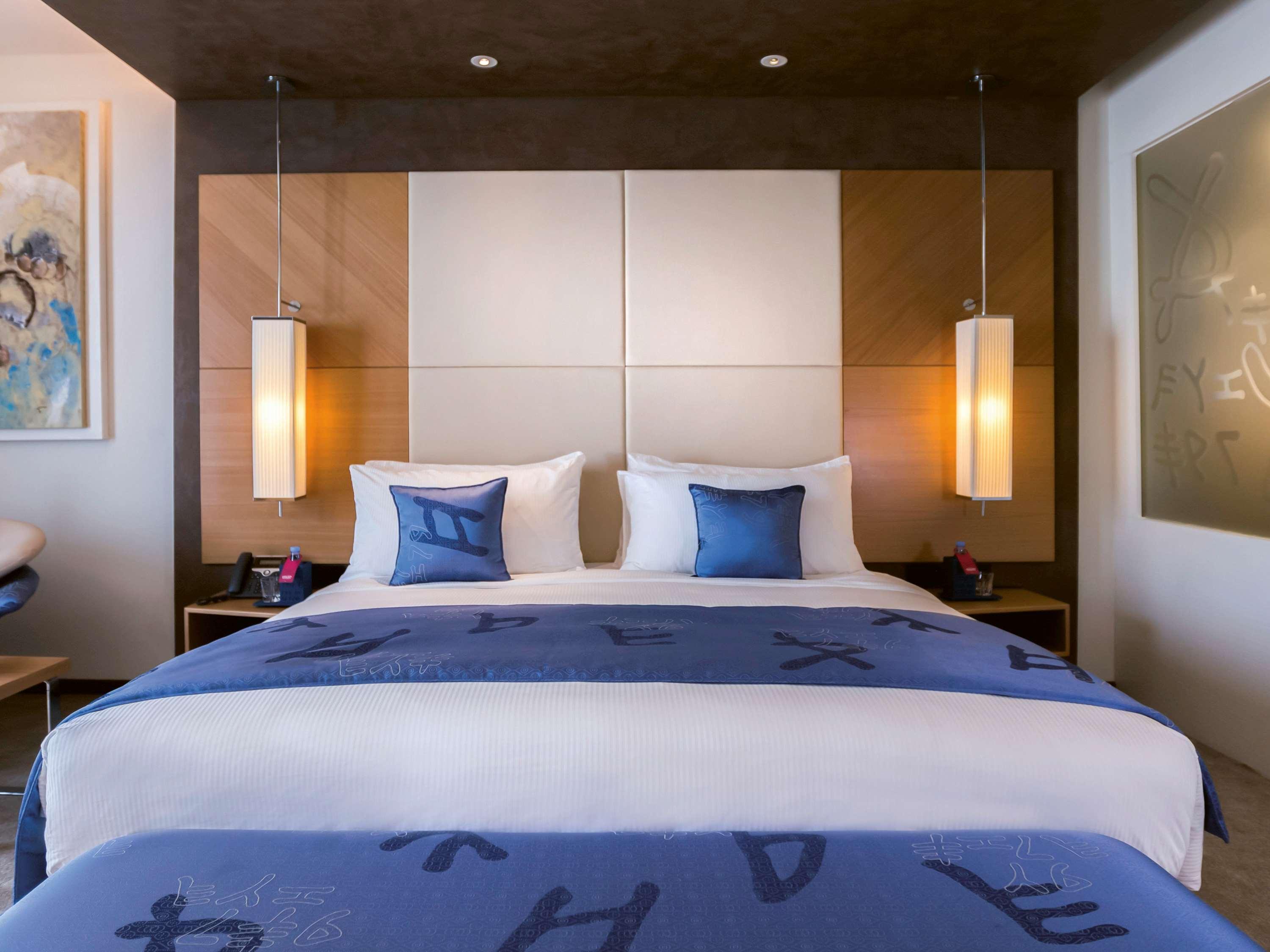 Moevenpick Hotel Du Lac Tunes Exterior foto A bedroom at the hotel