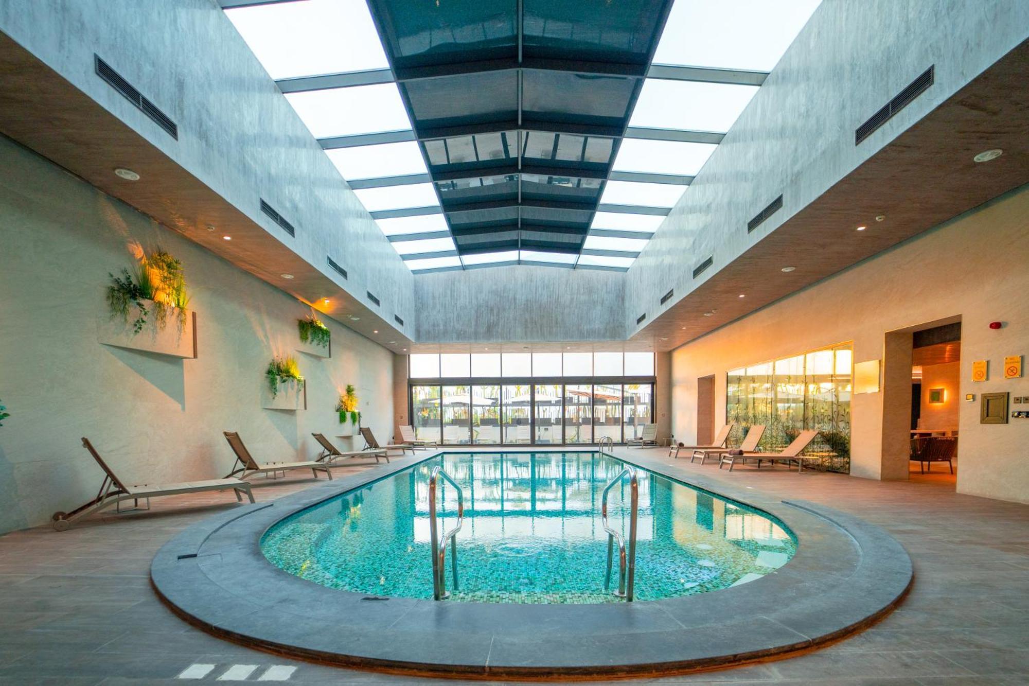 Moevenpick Hotel Du Lac Tunes Exterior foto The swimming pool at the hotel